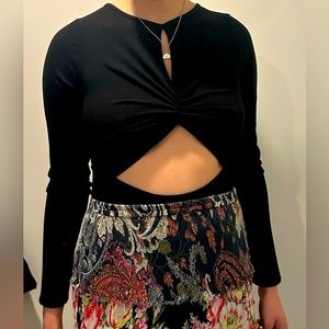 Black body suit with cutout